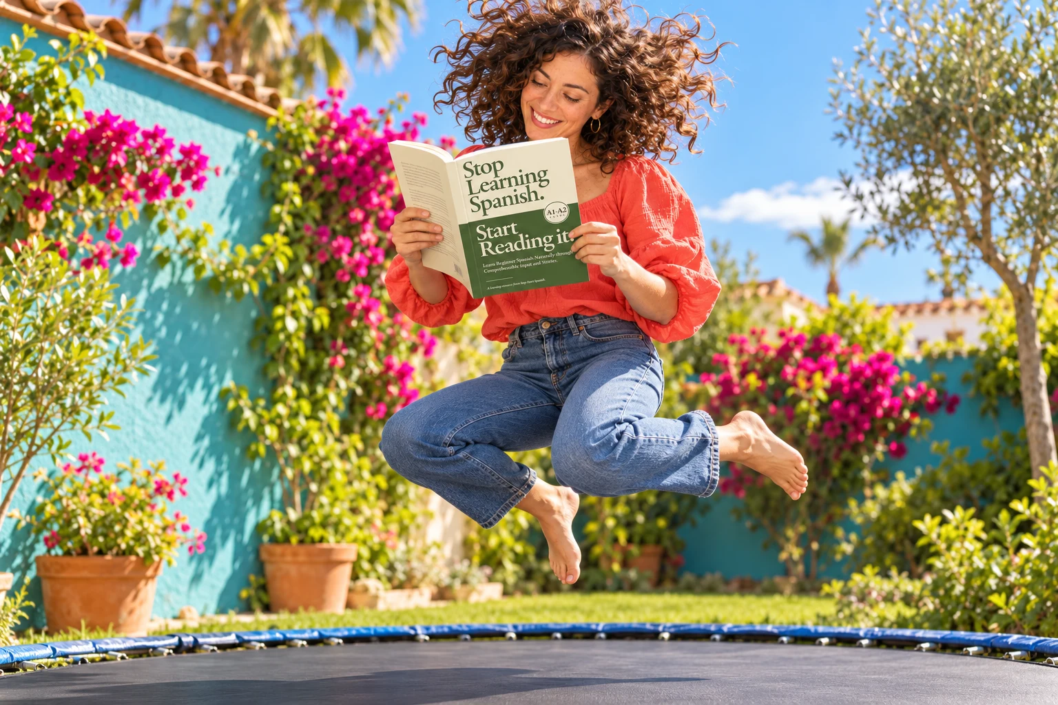 A woman reading the Beginner Spanish book while bouncing on a trampoline